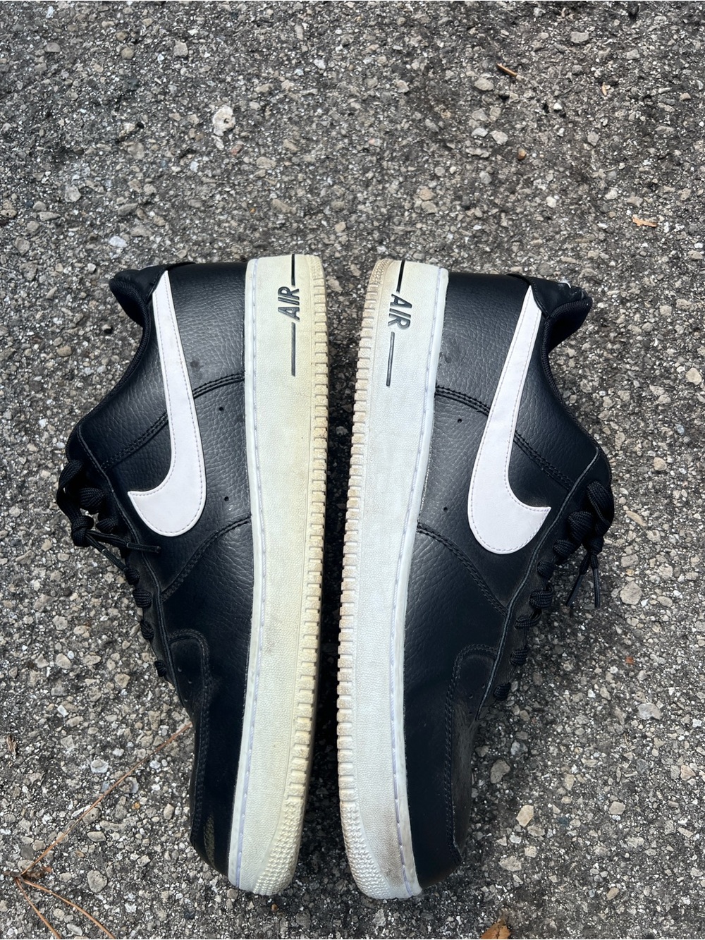 Nike Black Leather Low-Top Sneakers with White Swoosh